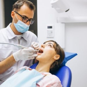 woman-patient-dentist_1303-9365